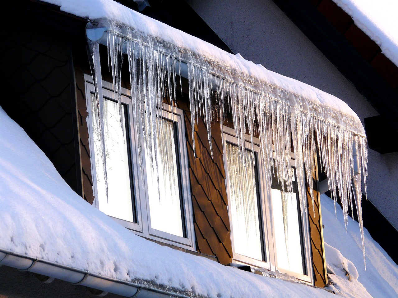 Snowy Climates and Roof Designs: Understanding the Basics